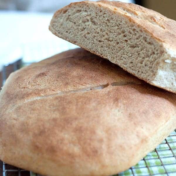 Step-by-step recipe for Whole Wheat Sourdough Bread along with instructions for making a sourdough starter with wild yeast. https://www.lanascooking.com/whole-wheat-sourdough-bread/