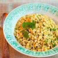 This recipe for Curried Corn combines fresh corn kernels with butter, cream, curry, and cilantro in an old, traditional deep south dish. Great for cookouts or dinner parties. https://www.lanascooking.com/curried-corn/
