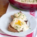 Alpine Eggs - eggs baked in a combination of Swiss and cheddar cheeses and served over toasted pumpernickel bread. https://www.lanascooking.com/alpine-eggs/
