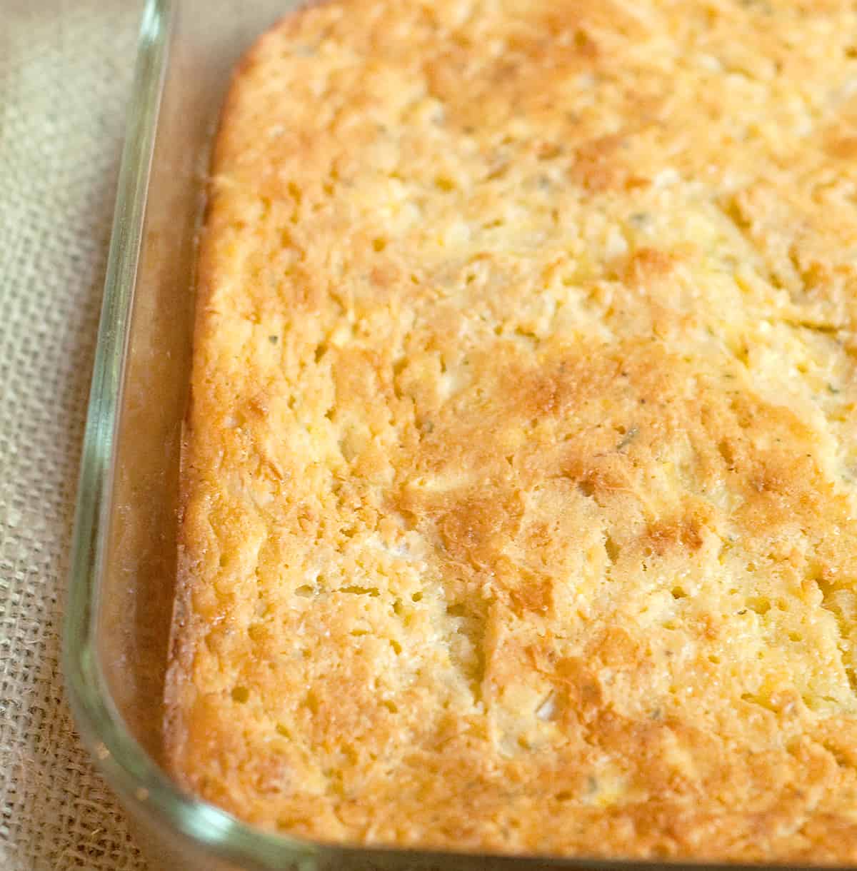 Finished Squash and Cornbread Casserole in a baking dish.