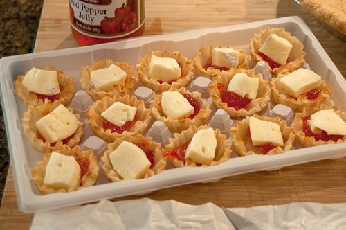 Phyllo cups filled with pepper jelly and brie.