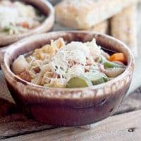 Classic Tuscan Minestrone soup - a classic Italian soup loaded with fresh, seasonal vegetables. Serve with Parmesan for topping and crusty Italian bread. https://www.lanascooking.com/tuscan-minestrone/
