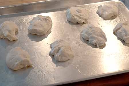Pretzel dough divided into eight pieces.