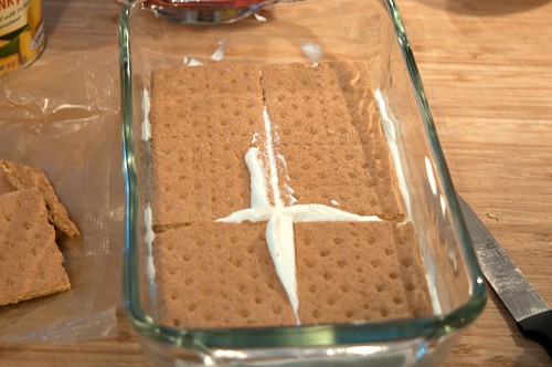 Graham crackers layered for Banana Split Icebox Cake