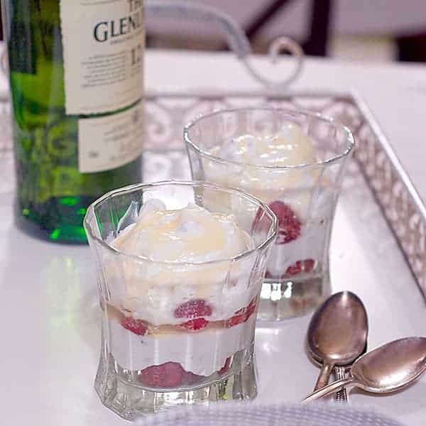 Cranachan - a traditional Scottish recipe of fresh raspberries, whipped cream, oatmeal, and Scotch whisky. https://www.lanascooking.com/cranachan-outlander/