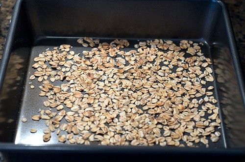 Toasted oatmeal in a baking pan.