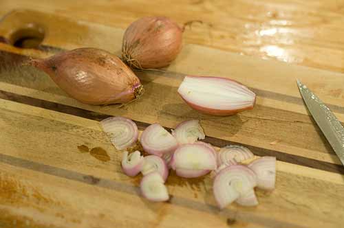 Prep shallots for Lemon Olive Chicken