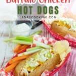 Two hot dogs topped with buffalo chicken and blue cheese are served in red baskets with celery, carrot sticks, chips, and a small cup of dip. Two beer bottles are in the background.