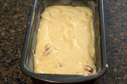 Lemon Raspberry Bread batter in loaf pan and ready to bake