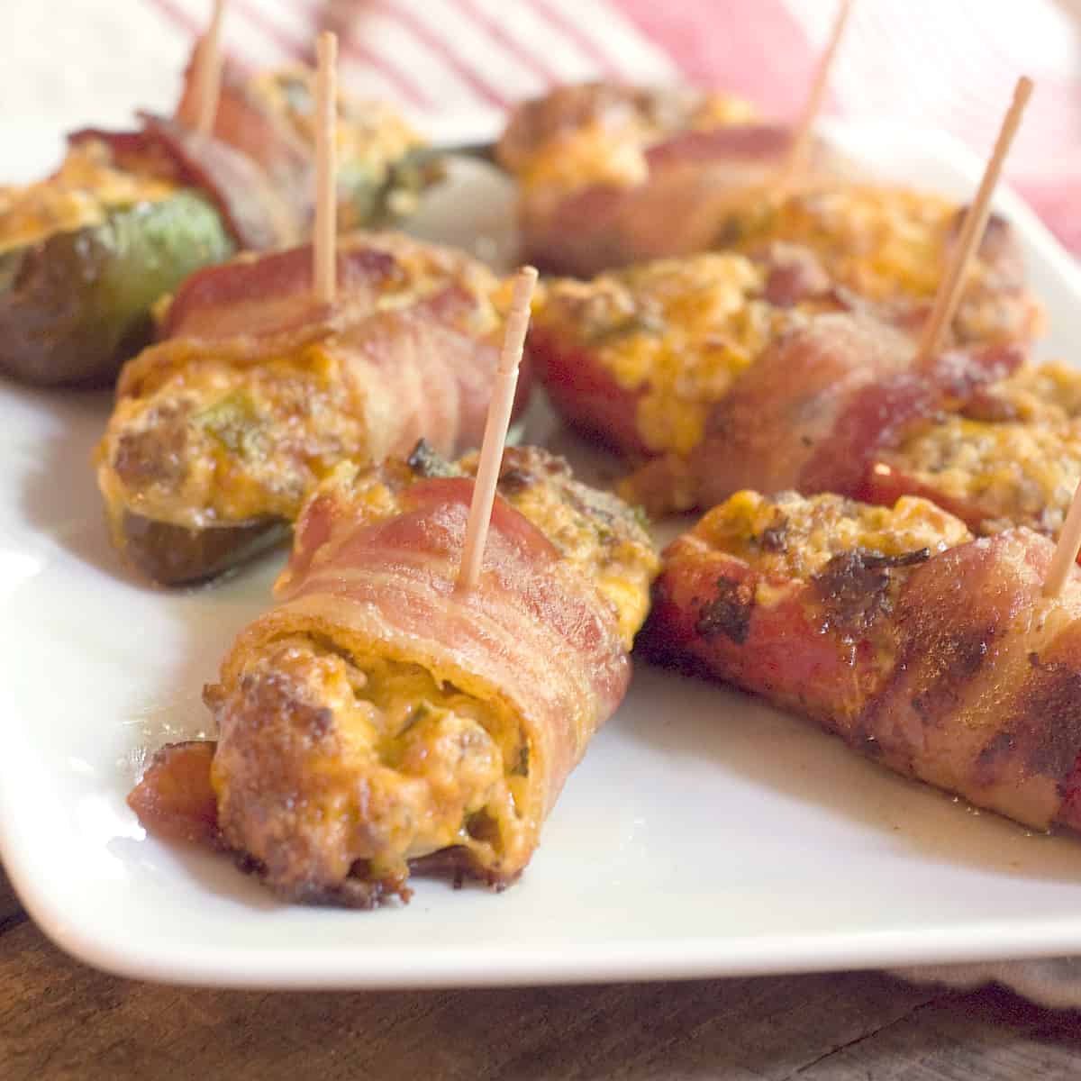Sausage Stuffed Bacon Wrapped Jalapenos from Never Enough Thyme