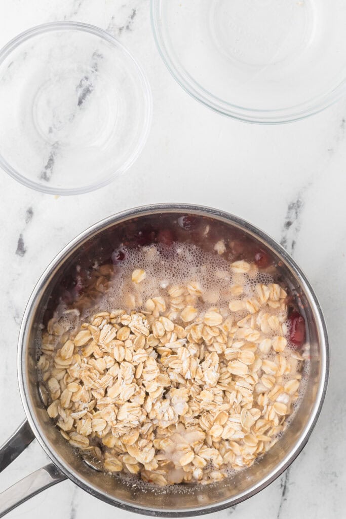 Rolled oats added to the boiling water.