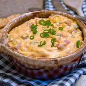 Warm Ham and Cheese Spread - it's like your favorite hot ham and cheese sandwich on a cracker! https://www.lanascooking.com/warm-ham-and-cheese-spread