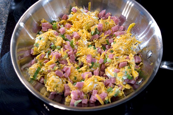 Heating dip in a skillet.