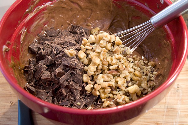 Chopped chocolate and walnuts stirred into the wet ingredients.