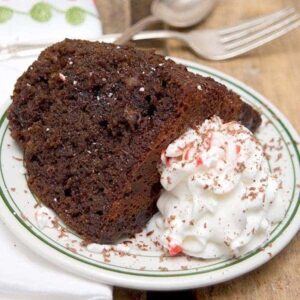 This delicious Triple Chocolate Slow Cooker Cake uses a boxed cake mix for convenience. Serve with whipped cream or ice cream. https://www.lanascooking.com/triple-chocolate-slow-cooker-cake/