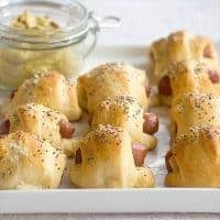 Sausage-Pineapple Rollups - great for football parties, tailgating, or just snacking. https://www.lanascooking.com/sausage-pineapple-rollups