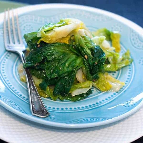 Lovely green escarole braised with olive oil, garlic, red pepper, and lemon juice. https://www.lanascooking.com/braised-escarole