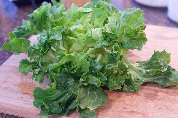 Prepare the escarole for Braised Escarole