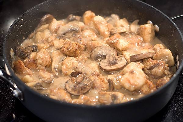 Finished mushroom and wine sauce with cooked chicken added.