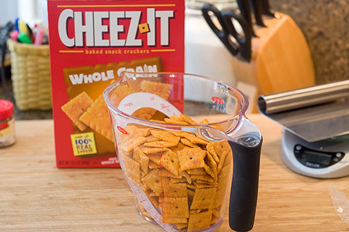 Cheese crackers in a measuring cup.