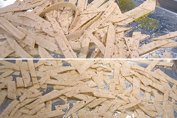 Tortilla strips with seasonings and oil on a baking sheet.
