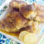 Lemon and Honey Glazed Chicken Thighs - Juicy chicken thighs coated with spices and glazed with honey and lemon. https://www.lanascooking.com/lemon-honey-glazed-chicken-thighs