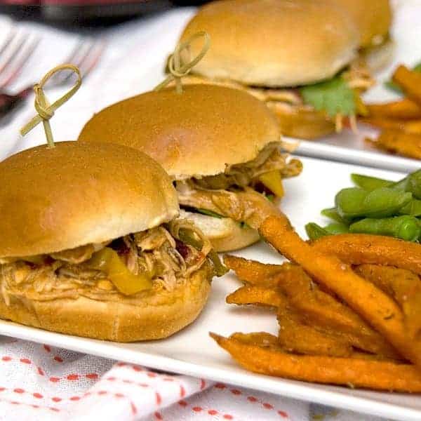 Apple Bourbon Barbecue Turkey Sliders - use purchased slow cooker sauce to make these barbecue turkey sliders quick and easy. https://www.lanascooking.com/apple-bourbon-barbecue-turkey-sliders