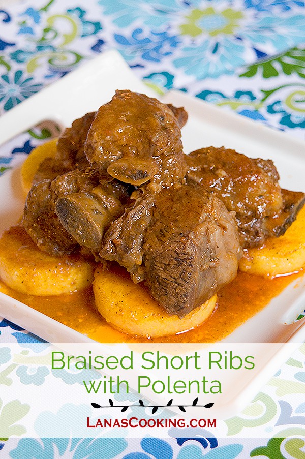 Braised Short Ribs with Polenta - Beef short ribs braised in a spicy sauce and served over polenta - from @NevrEnoughThyme https://www.lanascooking.com/braised-short-ribs-with-polenta