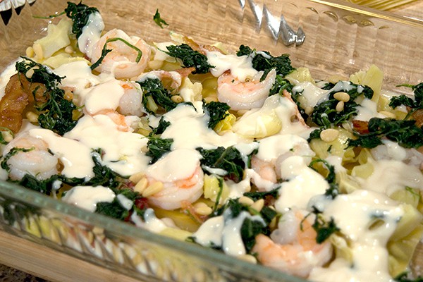 Assembly of Artichoke Spinach and Shrimp Lasagna with Bacon
