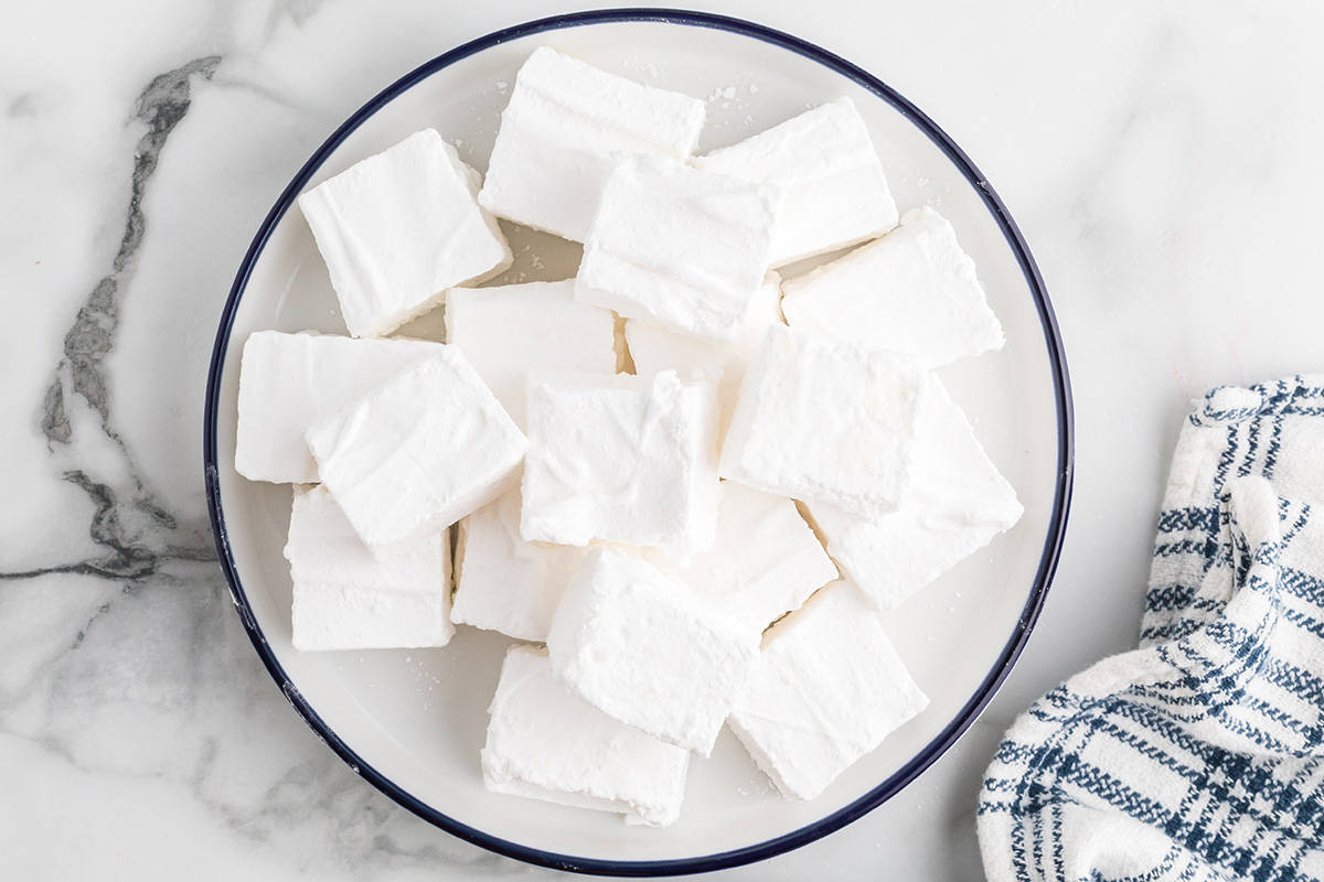 Cut marshmallows in a bowl.