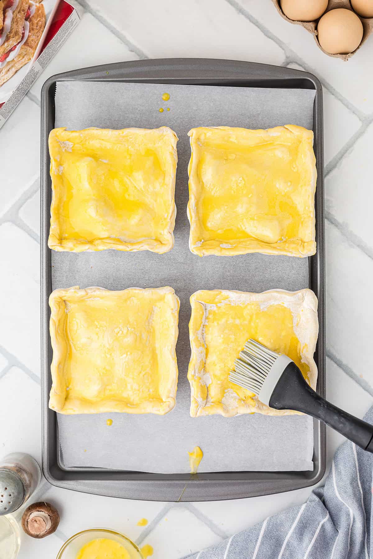 Tops of pastry brushed with egg wash.