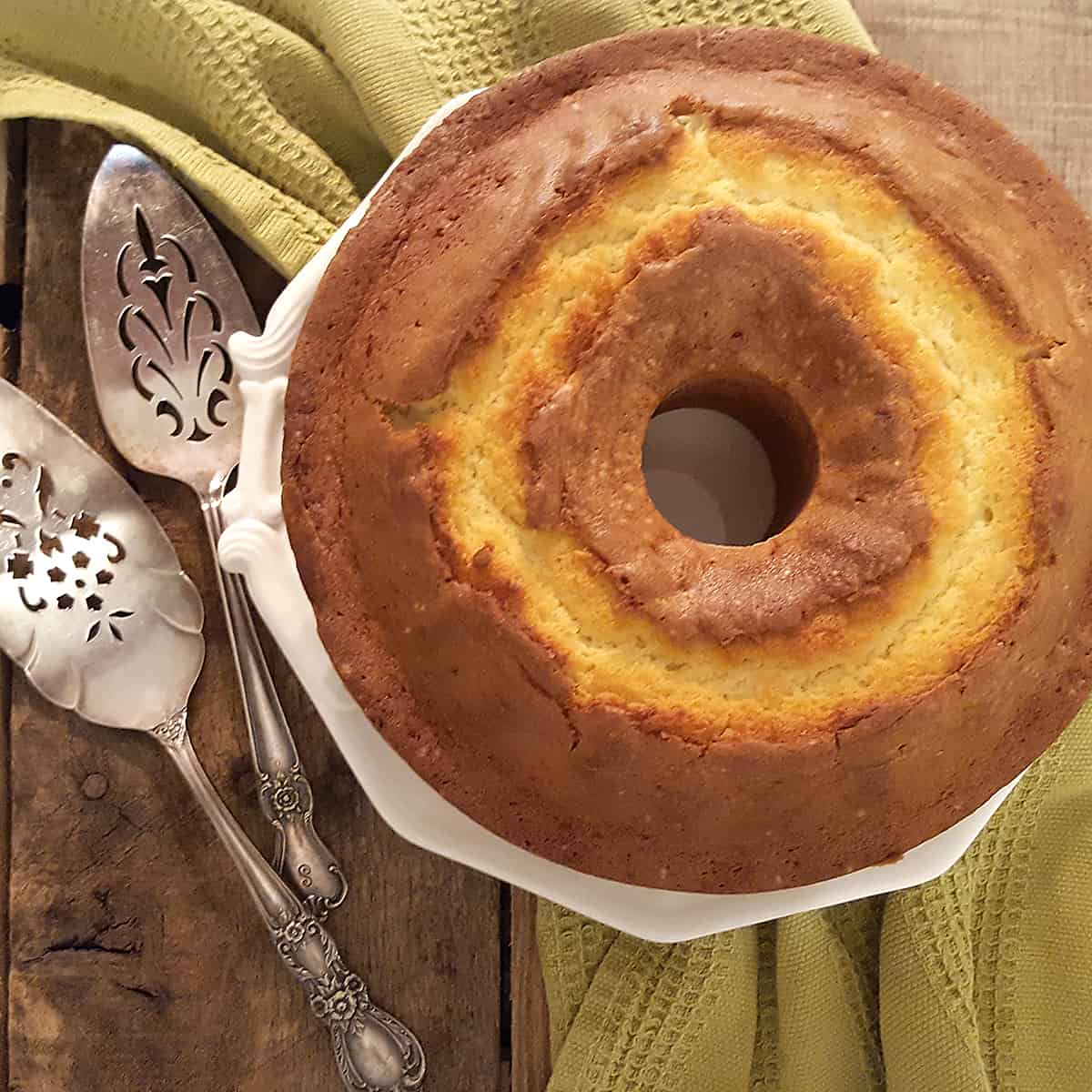 Never Fail Pound Cake - a classic old southern recipe for pound cake with the tang of buttermilk. https://www.lanascooking.com/never-fail-pound-cake-with-warm-berry-compote/