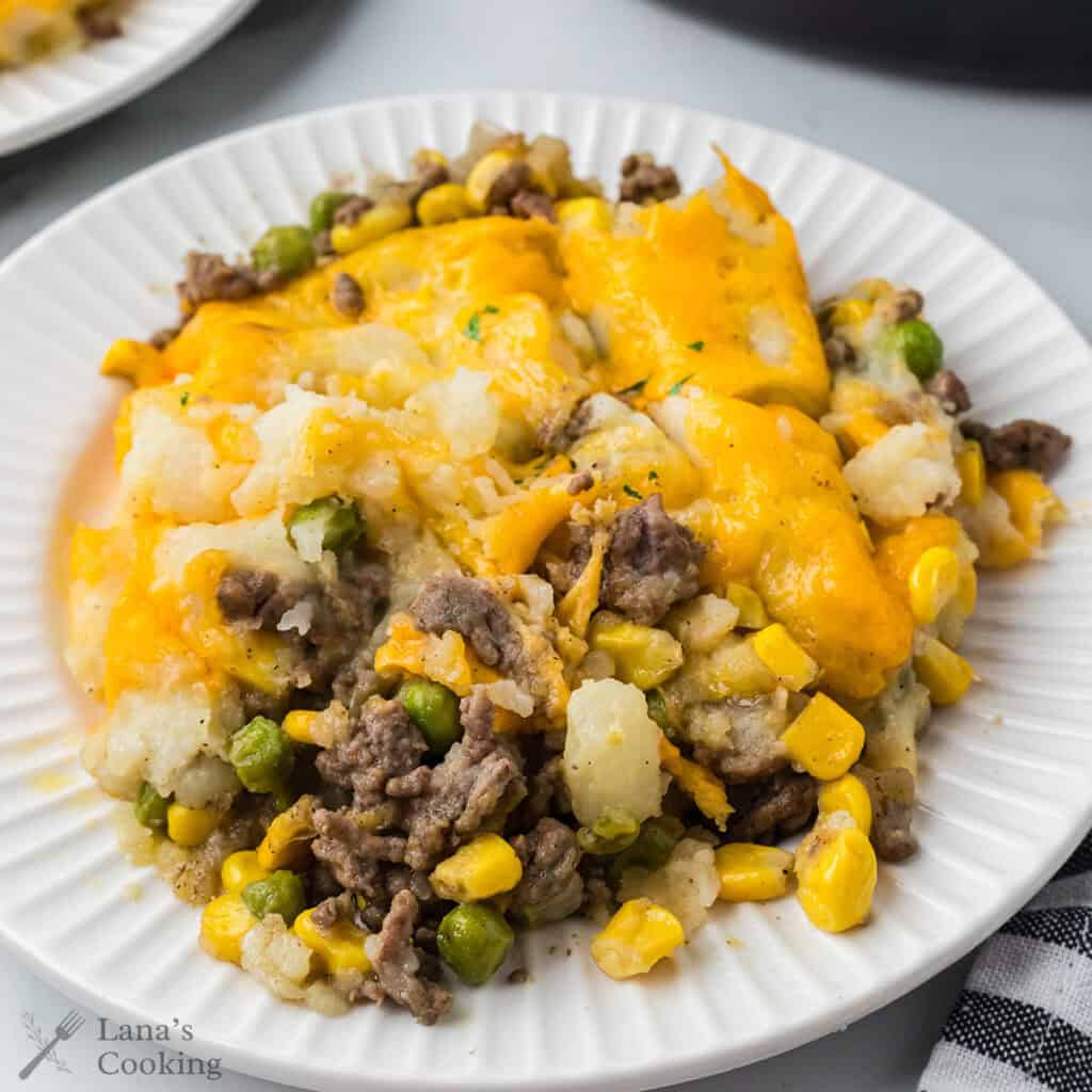 A serving of Shepherd's Pie on a white plate.