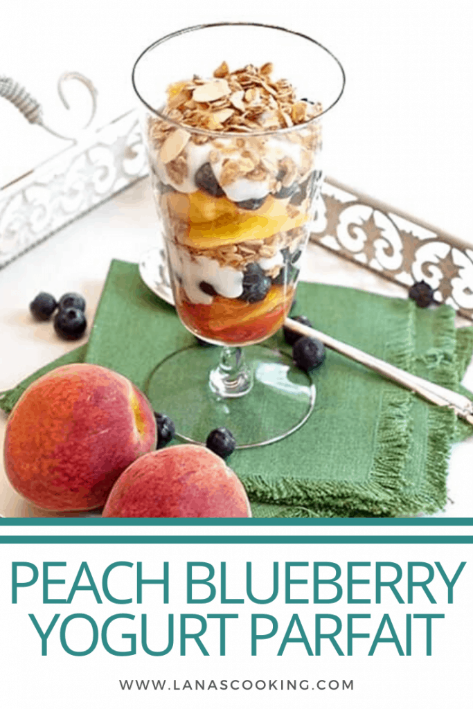 Peach Blueberry Yogurt Parfait. A summery yogurt parfait - layered ripe, juicy sweet peaches, blueberries and vanilla yogurt topped with lowfat granola. https://www.lanascooking.com/peach-blueberry-yogurt-parfait/