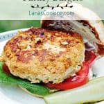Finished turkey burger on a dinner plate.