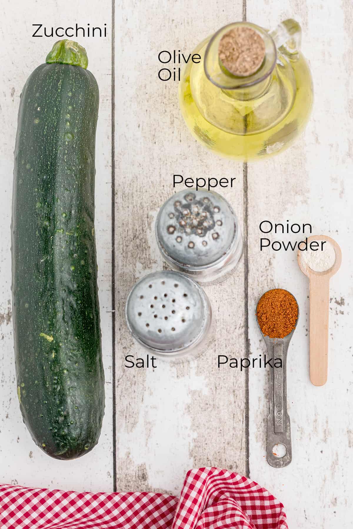 Ingredients needed for making crispy zucchini chips in the oven.