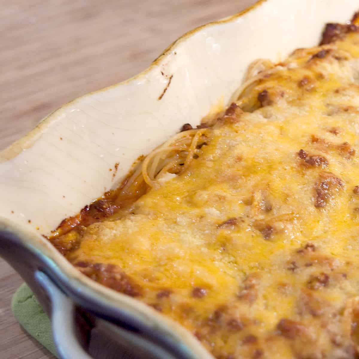This baked spaghetti contains layers of meat sauce, spaghetti, and cheese baked until bubbly. Very kid-friendly and quick and easy for the cook. https://www.lanascooking.com/baked-spaghetti/