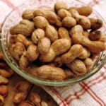 Boiled peanuts in a glass bowl.