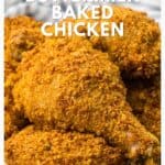 Crispy buttermilk baked chicken drumsticks stacked on a plate, with recipe text above them.