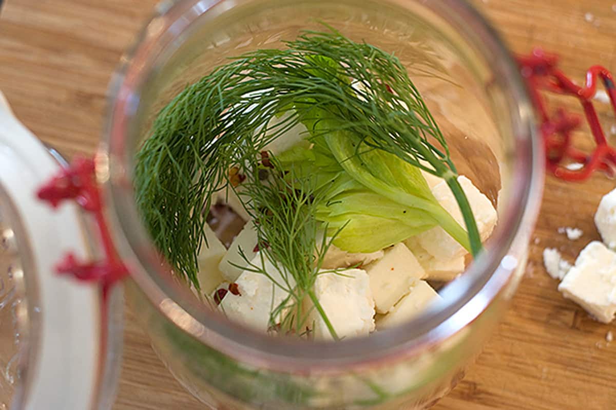 Ingredients being layered in a jar.