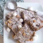 These delectable Butterscotch Brownies are just full of brown sugar, chocolate chips, pecans, and marshmallows. A nice change of pace from all chocolate. From @Nevrenougthyme https://www.lanascooking.com/butterscotch-brownies/