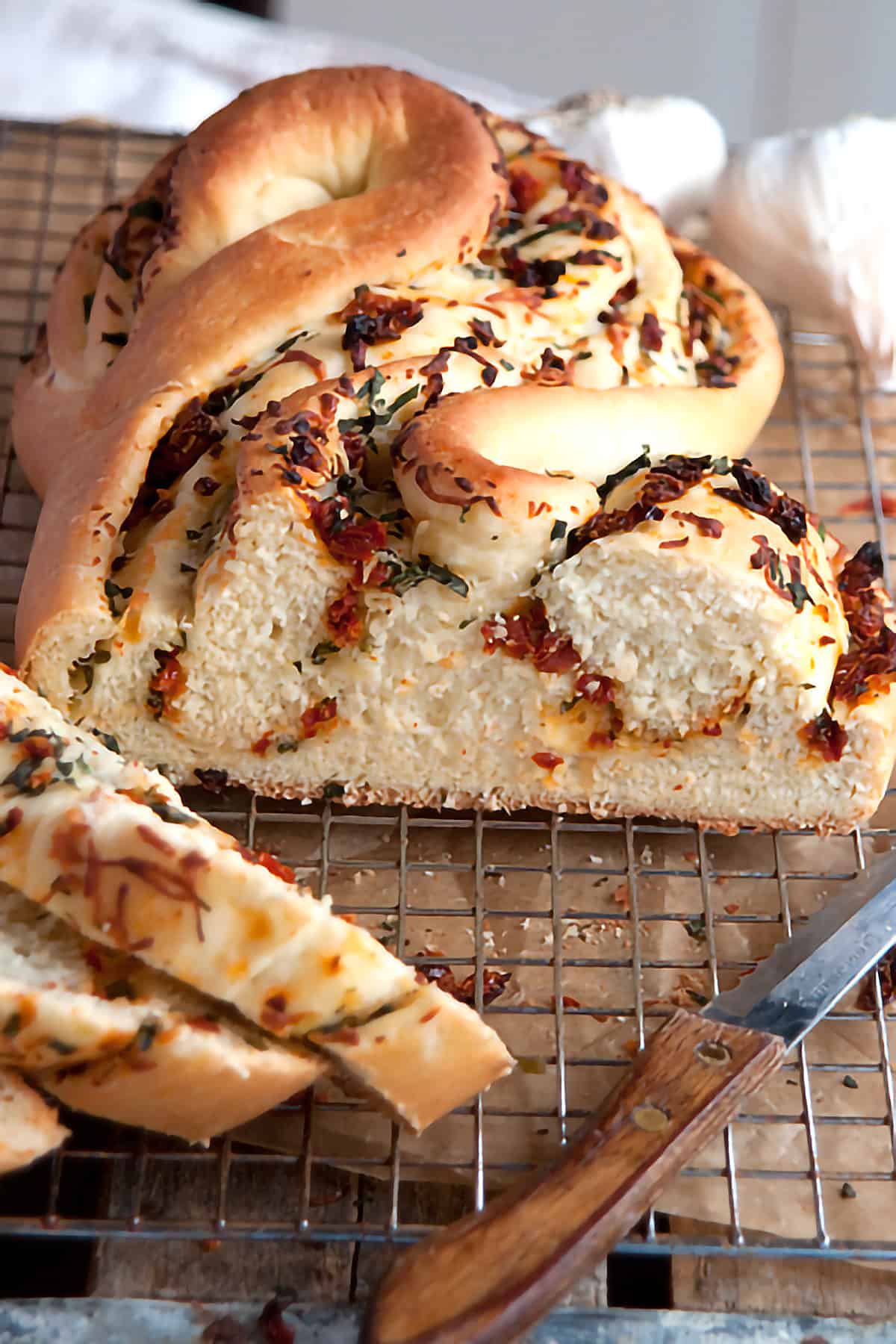 Pane Bianco loaf sliced in half showing a cross section of the baked loaf.