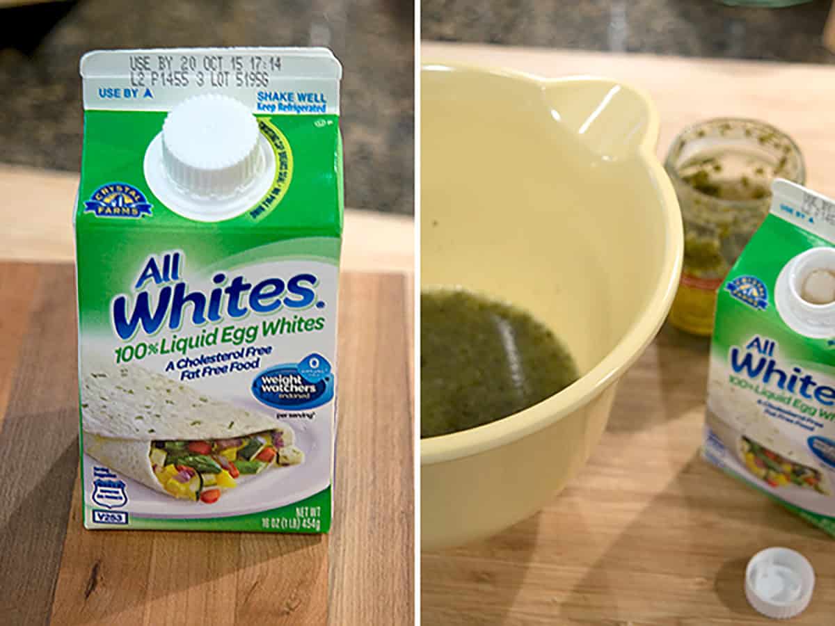 Carton of AllWhites liquid egg whites next to a mixing bowl and a jar of pesto on a wooden surface.