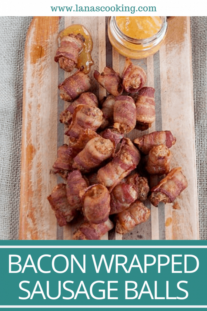 Bacon Wrapped Sausage Balls - Spicy, herby, cheesy sausage balls wrapped in bacon and served with a peach-Dijon dipping sauce. https://www.lanascooking.com/bacon-wrapped-sausage-balls