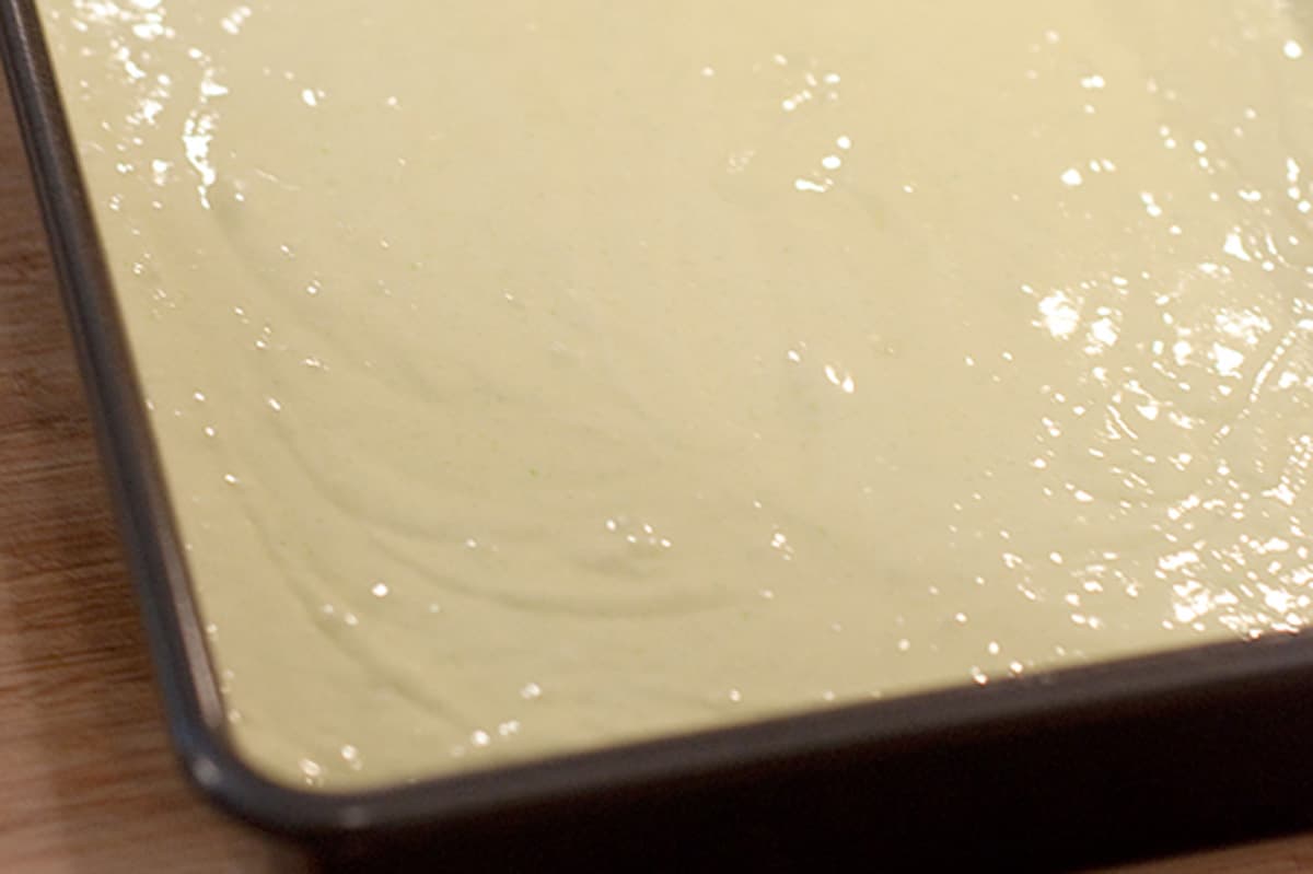 Finished cake batter in a baking pan.