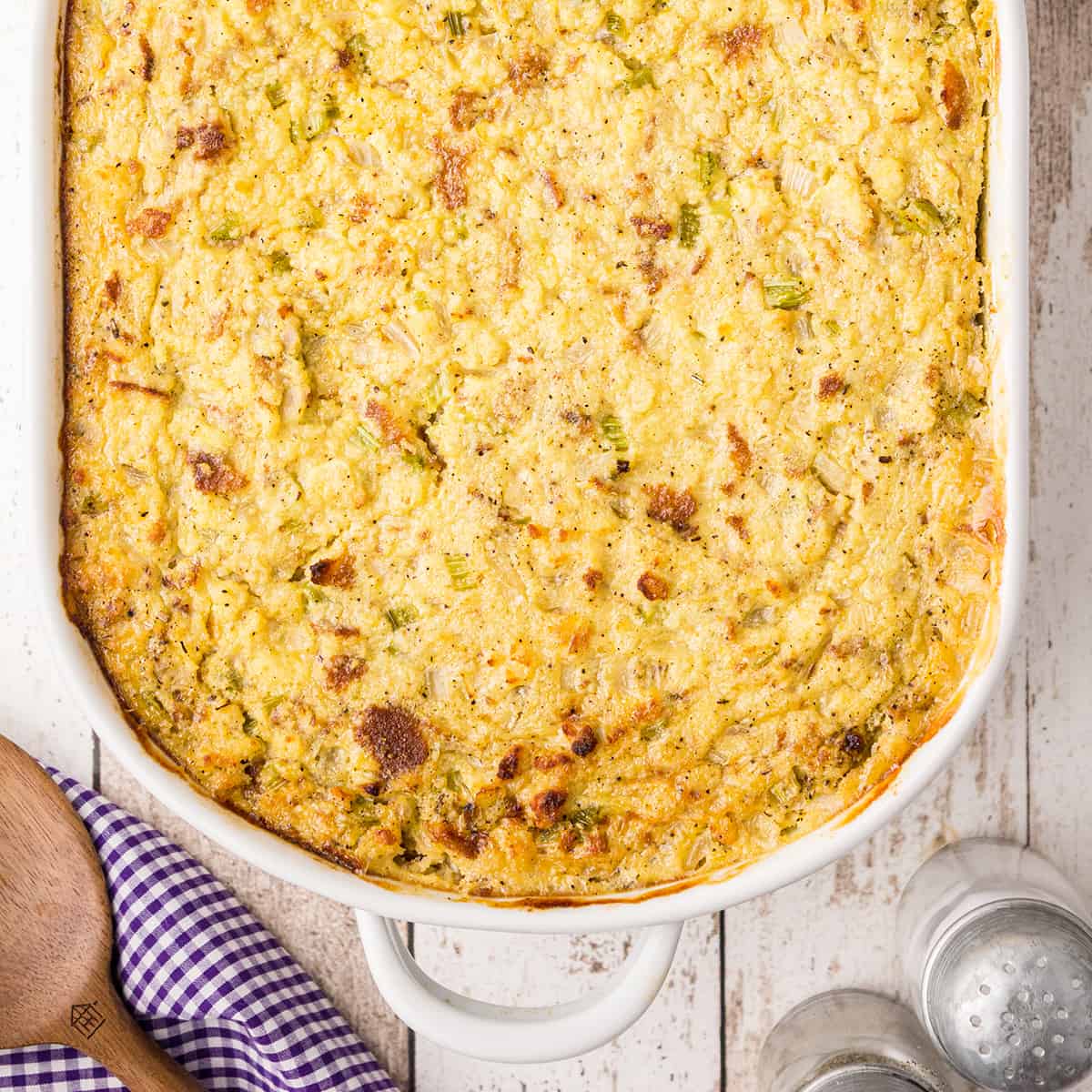 Southern Cornbread Dressing in a white baking dish.