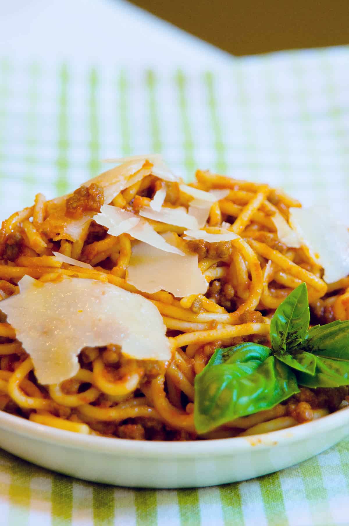 Finished bolognese sauce with spaghetti in a serving bowl.