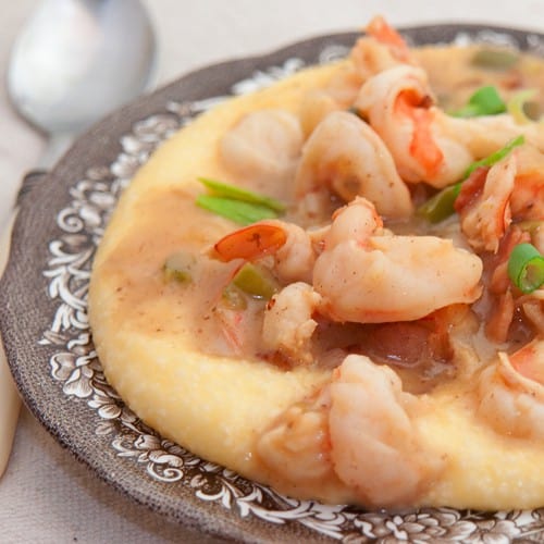 Shrimp and Grits on a decorative plate.