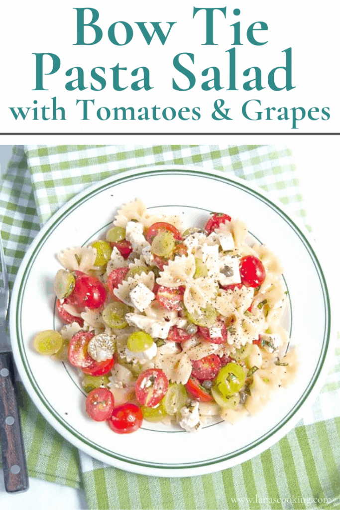 Bow Tie Pasta Salad with Tomatoes and Grapes - a surprising combination for a refreshing summery pasta salad. Great for a cookout or picnic! https://www.lanascooking.com/bow-tie-pasta-salad-with-tomatoes-and-grapes/
