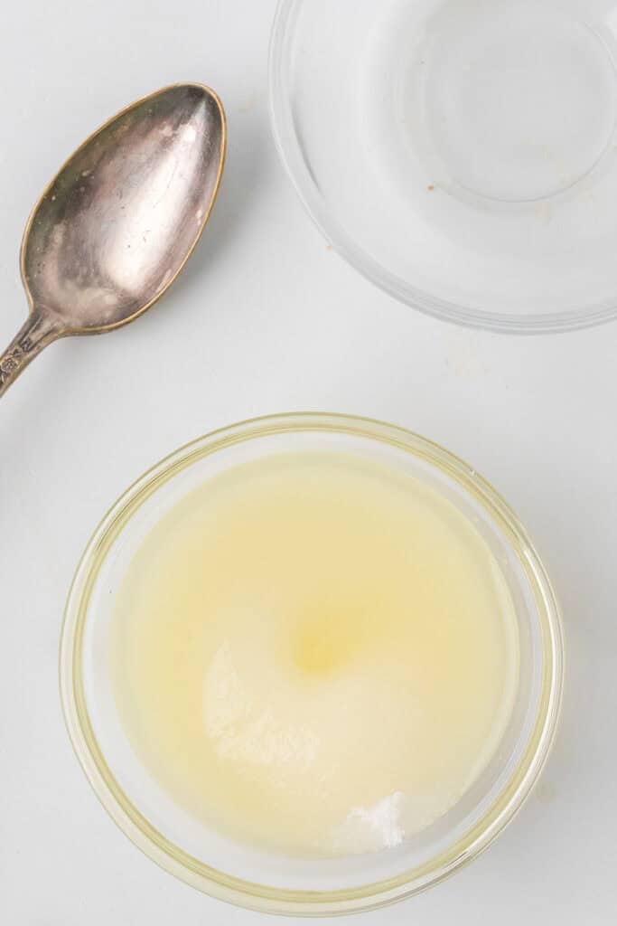 Lemon juice and sugar in a bowl.